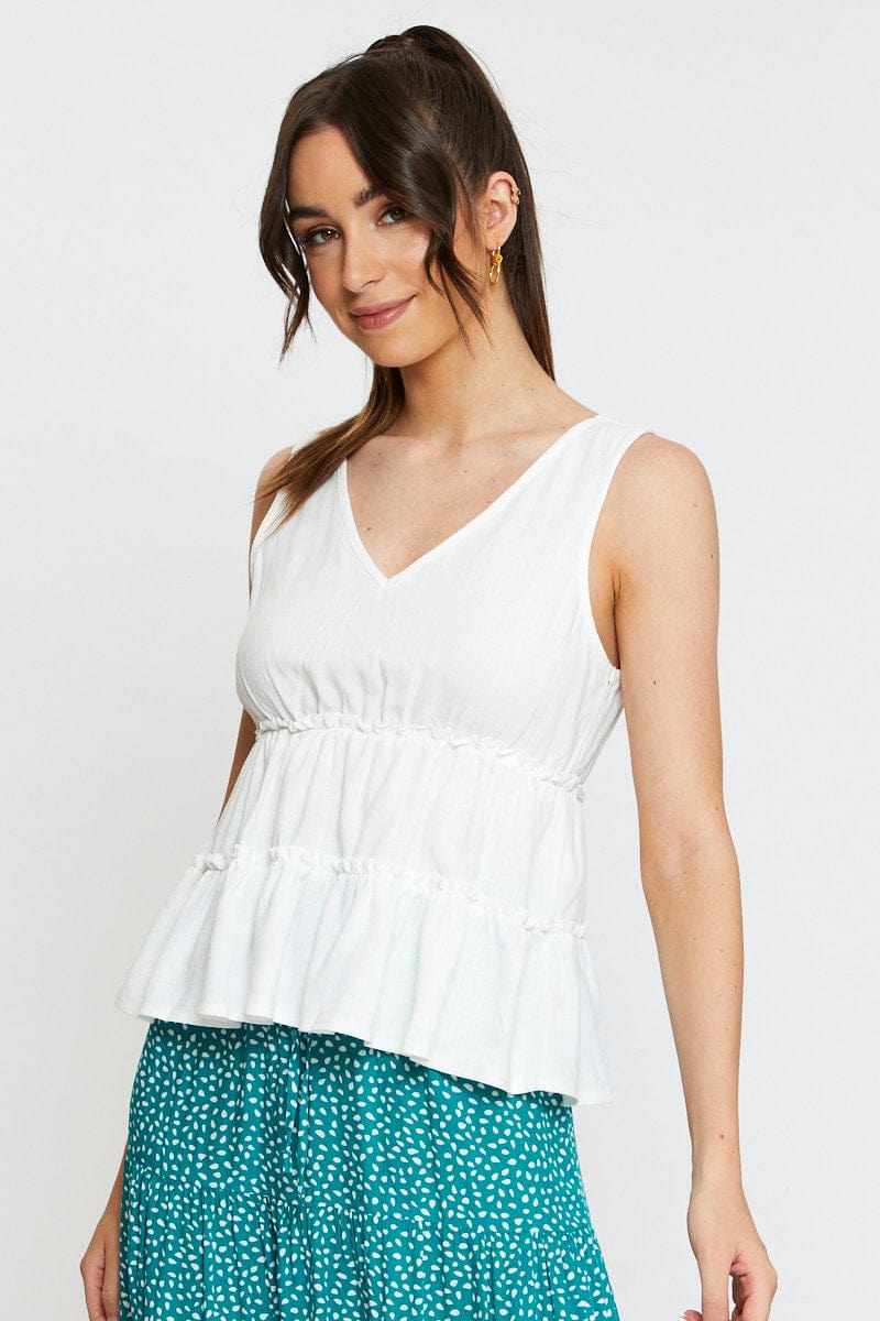 White Peplum Blouse Sleeveless V-Neck - Image 3